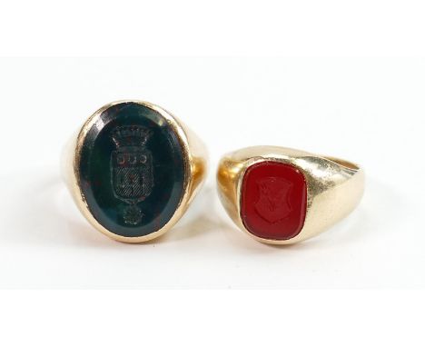 2 x gold and armorial crested hardstone rings: The smaller ring set carnelian size M/N and marked .585, the larger set bloods