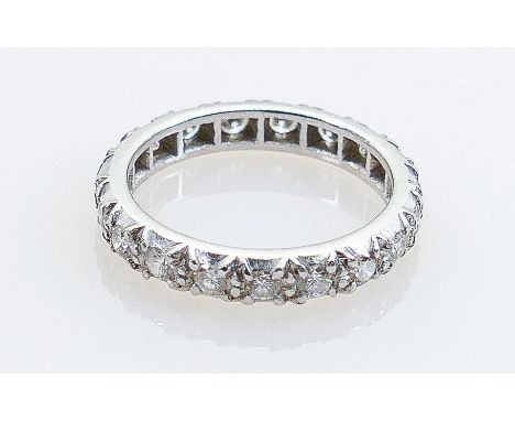 18ct white gold or platinum diamond eternity ring about 1ct: Set with 19 diamonds each about 5 points, so total carat weight 