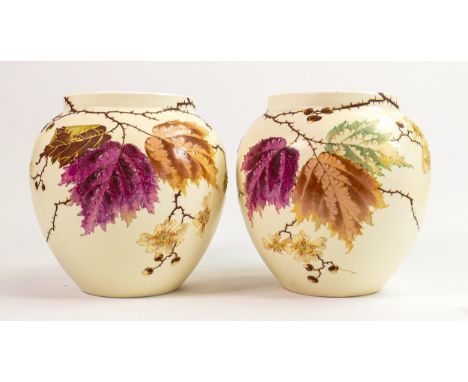 Pair of Wedgwood Etruria works floral decorated lamp bases: Hand painted with raised gilded decoration h.15cm. (2) 