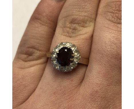 9CT GOLD RUBY AND CZ CLUSTER RING SIZE O 2.3G APPROX