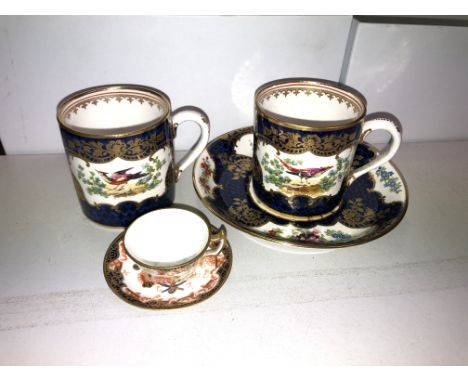 18TH CENTURY WORCESTER COFFEE CAN AND SAUCER AND ONE COFFEE CAN AND A MINIATURE ROYAL CROWN DERBY CUP AND SAUCER