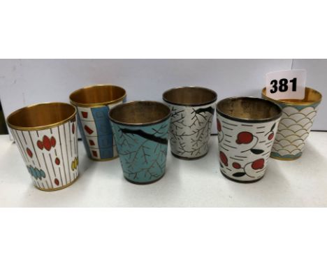 SERIES OF SIX METAL AND ENAMEL DECORATIVE BEAKERS