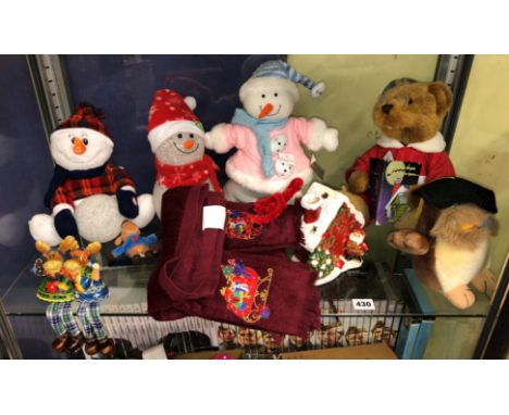 SHELF OF CHRISTMAS RELATED ORNAMENTS AND SOFT TOYS