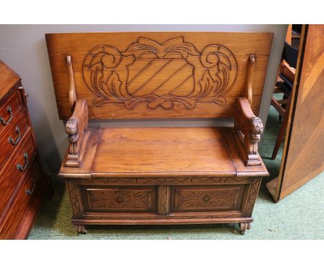 Oak Monks Bench with Lions head handles with Shield carved back 
