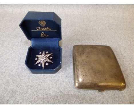 Silver paste set starburst brooch, 3.6cmW, with a silver cigarette case, 115g (3.7ozt) gross