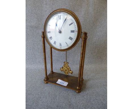 French Brass portico clock with 4 pillars and fruit basket pendulum, enamel dial bearing roman numerals . 13x6x22 cm