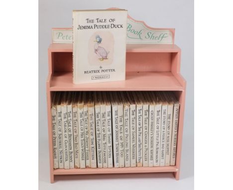 POTTER, Beatrix - Works:, 23 vols., with dustwrappers, in 'Peter Rabbit's Book Shelf'.
