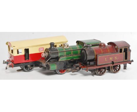 Small tray containing green Bing 0-4-0 elec loco No. 504 fitted with headlamp crazing to paintwork, no tender (F/G), scratchb