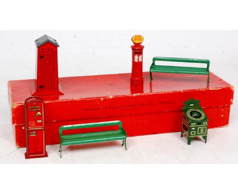 Hornby 1938-41 Railway accessories No. 3, 6 piece set comprising Dinky Toy pillar box, 2x lighter green seats, platform ticke