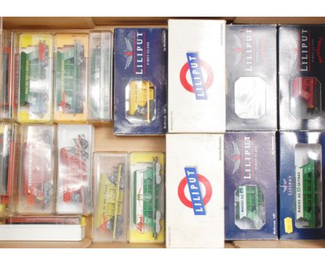19 boxed Liliput Kieswagen bogie hopper wagons, various company names/liveries (G,BG)