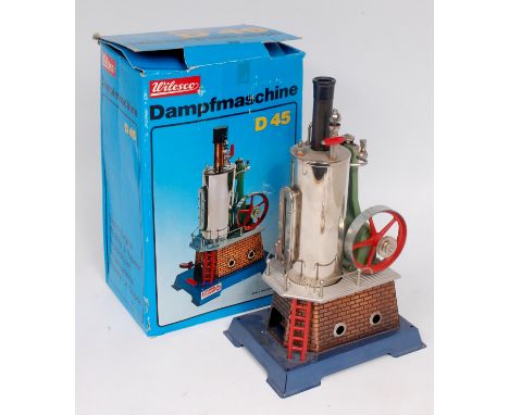 Wilesco, D45, vertical stationary steam engine, tin housed brick worked boiler with sight glass, steam whistle, oil cap, cut-