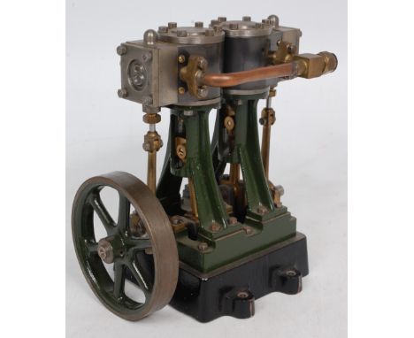 Stuart Turner D10 stationary marine engine comprising of twin cylinder, suspended on A frames, with slip eccentric and slide 
