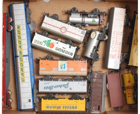 13 boxed and 14 unboxed continental goods wagons by Marklin, Liliput, Lima, Trix Express, Jouef, Fleischmann etc (G,BF-G)