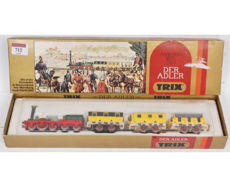 A Trix H0 'Der Adler' set (First German train) with engine and 3 coaches (G,BG)