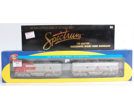 A Bachmann Spectrum H0 gas electric 'Doodlebug' railcar in Burlington green livery (G,BG), and an Athearn H0 2-car F7 (A and 