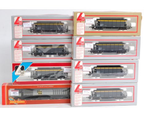 A Hornby R332 Class 58 diesel, Railfreight grey (G-NM, BG-NM) with 7 Lima 'Seacow' bogie ballast hopper wagons, engineers' gr