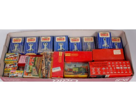 A quantity of un-used boxed Triang Centenary wire equipment, 5 single and 4 double Hornby Dublo colour light signals, and a n