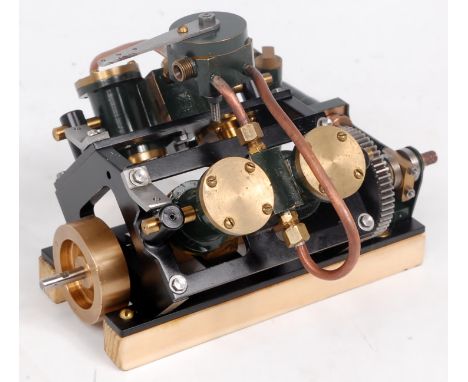 A well made model of a 4 cylinder Oscillating Marine Engine, constructed from brass and gun metal components, comprising of 4