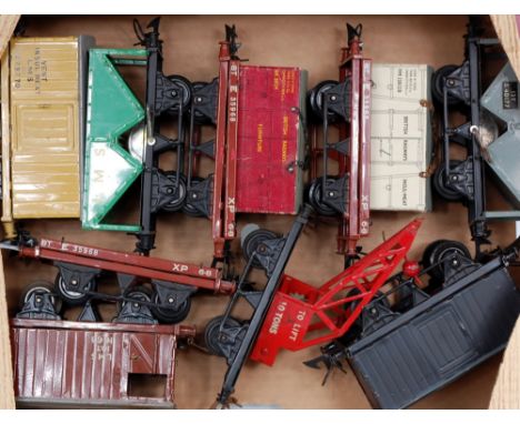 A small tray containing 9 postwar Hornby wagons including LMS hopper, LMS No. 1 refrigerator van, LMS goods brakevan, BR hopp