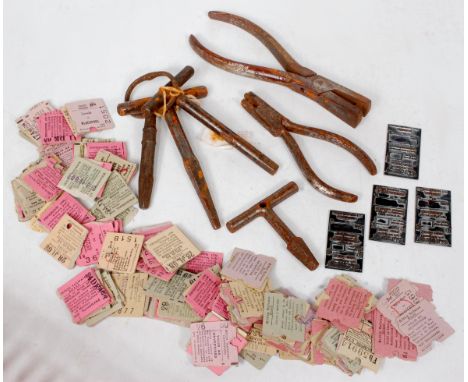 Tray of railway tools, to include Two Ticket Punches, Four Carriage door keys, ticket halves, and four printing plates for SR