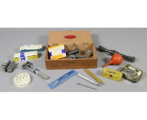 A wooden box of horologist/watch makers specialist tools including a boxed P.M.Detector Eterna watch blade, Jaxa case back sp