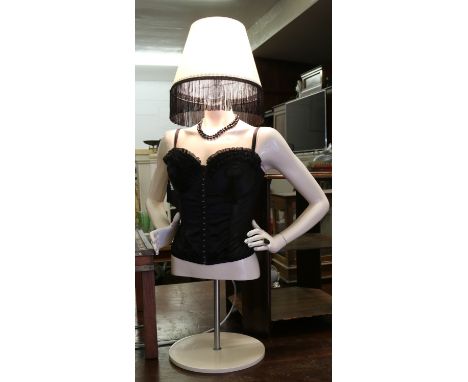 An unusual 1980s mannequin formed into a burlesque tablelamp.