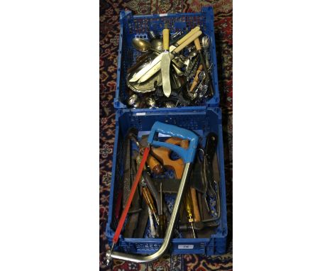 A collection of various hand tools and flatwares.