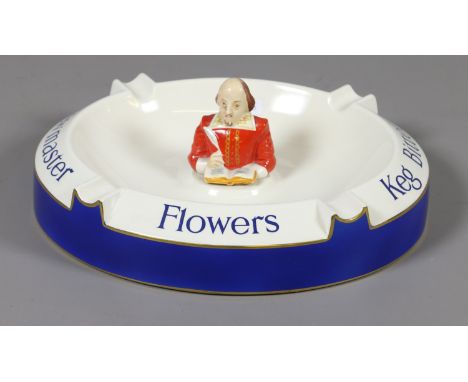 A Carltonware advertising ashtray for Flowers Brewmaster Keg Bitter, surmounted with a figure of William Shakespeare, 