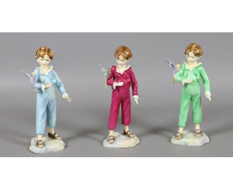 Three Royal Worcester figures by F. G. Doughty. Parakeet in puce green and blue colourways.