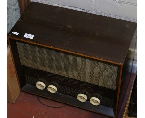 A mahogany cased Ferranti three wave band valve radio model number 255.