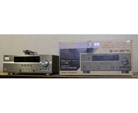 A boxed Yamaha DSP- AX861SE AV amplifier with instructions.