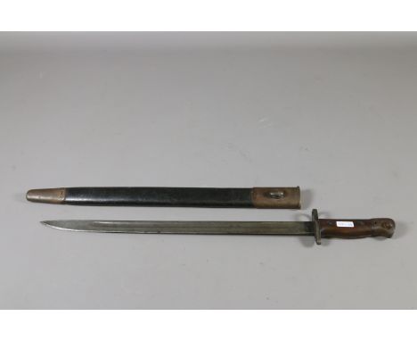 A World War I sheathed Wilkinson bayonet.