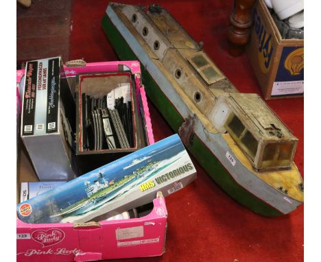 A tinplate model motor launch, along with a box of collectables including a boxed Airfix model of HMS Victorious, vintage tel