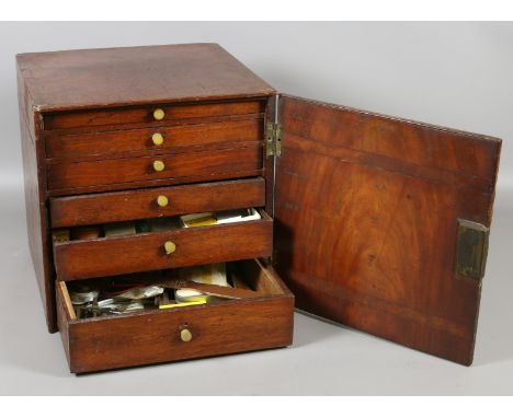 A Victorian mahogany six drawer chest of horologist/watch makers tools and watch spares.