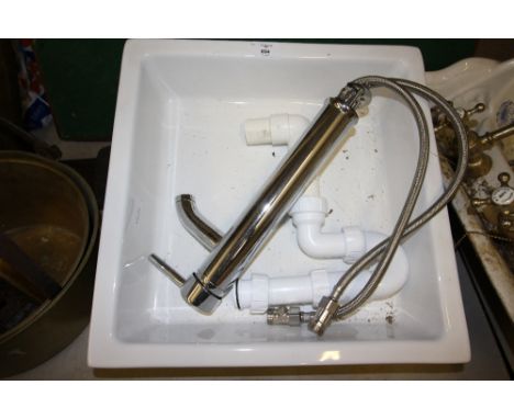 New hand basin with tap and fittings