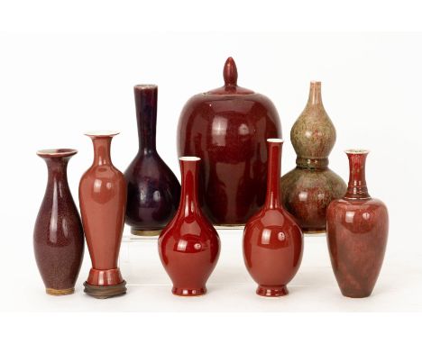 A GROUP OF EIGHT CHINESE MONOCHROME GLAZED VASES
To include amphora shaped examples; a peach bloom double gourd vase; various