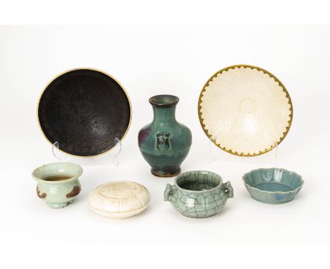 A GROUP OF SEVEN EARLY STYLE CHINESE CERAMIC ITEMS
To include a Ding style conical bowl; a black glazed similar bowl (large r