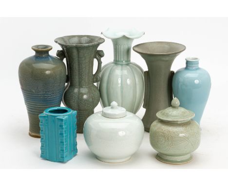 A GROUP OF EIGHT ASSORTED CHINESE CERAMIC VASES
To include a blue glazed cong shaped example; celadon; qingbai and crackle gl