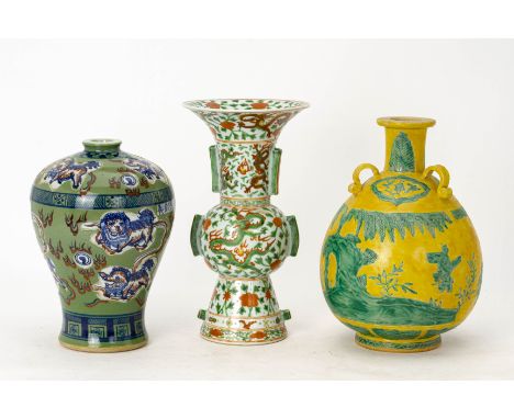 A GROUP OF THREE CHINESE CERAMIC VASES
Comprising a green ground meiping; a wucai gu vase; and an incised yellow and green en