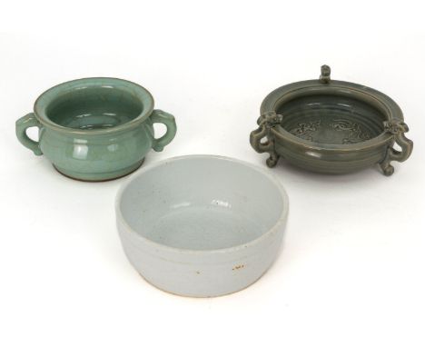 THREE VARIOUS CHINESE CERAMIC DISHES
Comprising: a celadon twin handled censer; a tripod bowl with dragon supports; and a whi