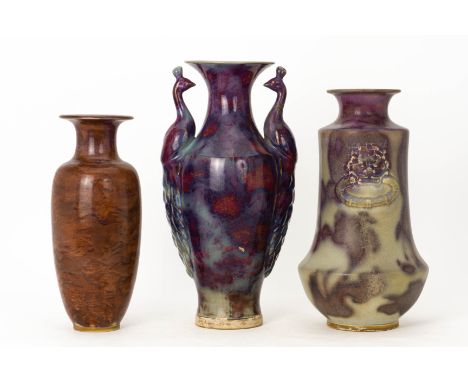 A GROUP OF THREE LARGE CHINESE CERAMIC VASES
Including one example with twin peacock handles
The largest 48cm high
Condition: