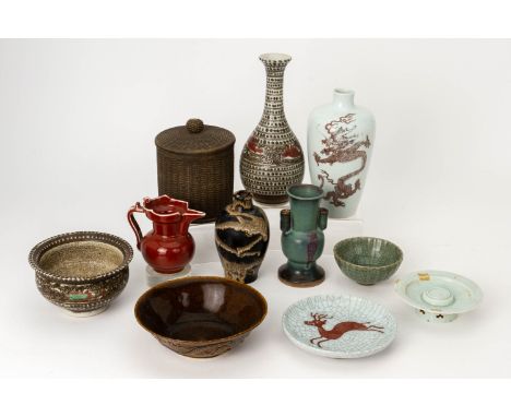 A GROUP OF ELEVEN CHINESE CERAMIC ITEMS
To include an underglaze red dragon meiping vase; a relief moulded dragon and phoenix