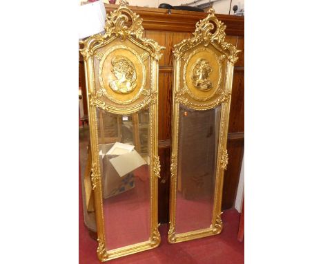 A pair of contemporary French floral and portrait silhouette decorated bevelled marginal wall mirrors, each 178 x 53cm