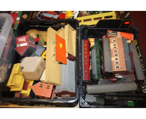 Two trays containing a quantity of mixed 00 gauge model trains, lineside buildings and other related accessories to include H