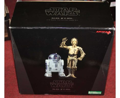 An Art FX Star Wars R2D2 and C3P0 1/10 scale pre-painted model kit (the R2D2 figure has faded to one side but housed in the o