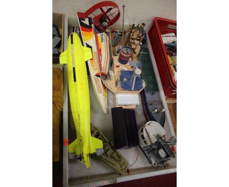 A tray of mixed kit built and radio controlled model boats and spares, to include a marine modelling high speed powered racin