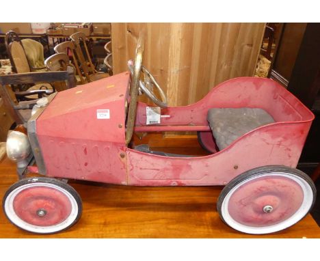 A painted pressed metal child's model vintage car, length 80cm 