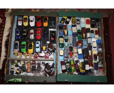 Two trays containing a selection of loose 1/43 scale diecast to include Norev, Vanguard, Del Prado and others, specific examp