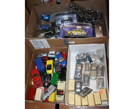 Three trays containing a quantity of mixed boxed plastic cased and pewter diecast vehicles and accessories to include an Auto