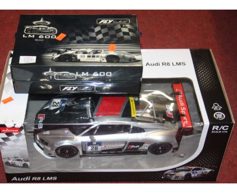 A Rastar radio controlled model of an Audi R8 LMS, and a Fly 1/32 scale model of a limited edition Le Mans 600 Marcos 1998 ra